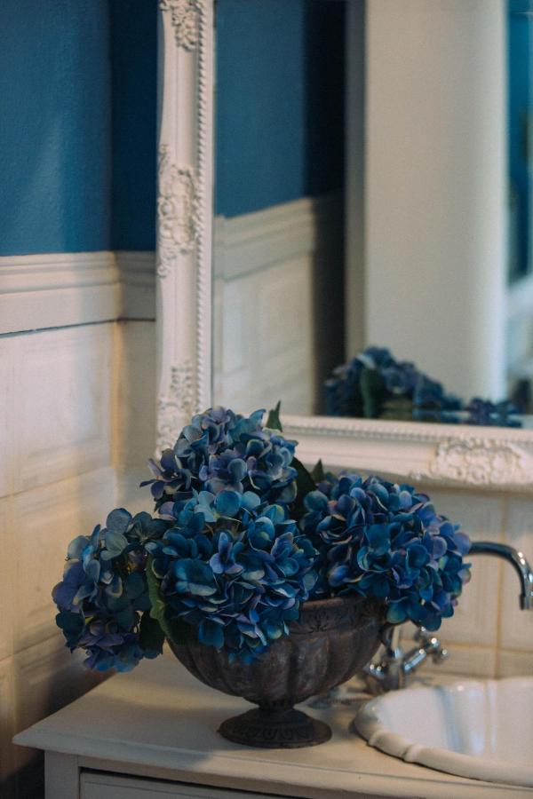 Bathroom with blue hydrangeas